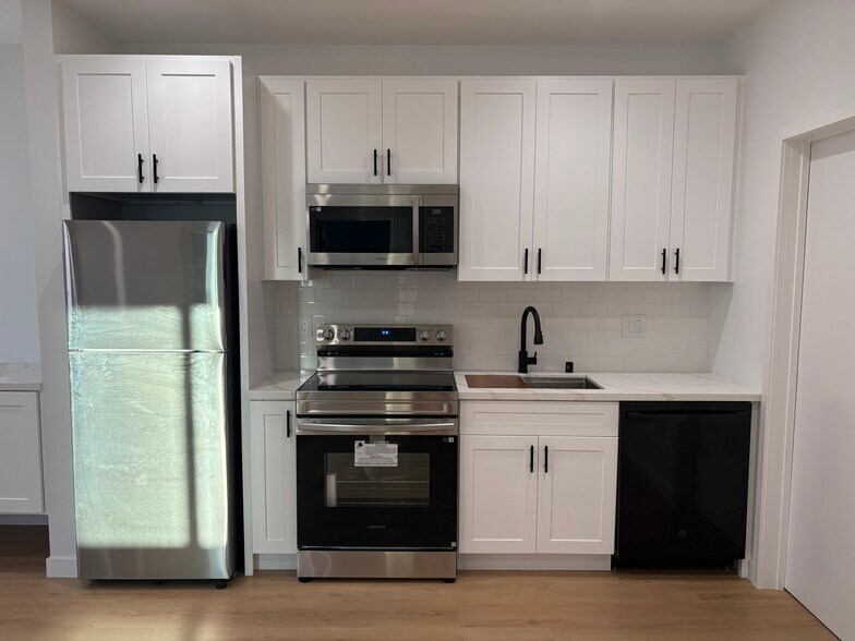 Brand new appliances (microwave, stove, and dishwasher included) - 7834 S Harvard Blvd