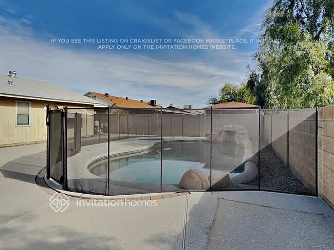 Building Photo - 9023 W Harmont Dr