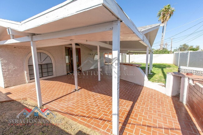 Building Photo - 8119 E Amelia Ave