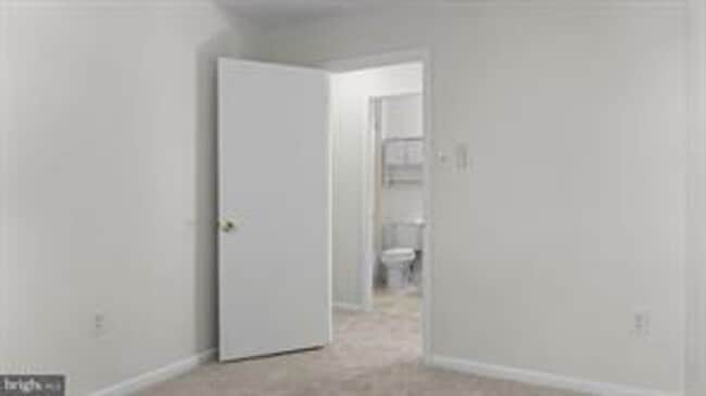 Building Photo - RENOVATED TOWNHOUSE WITH 3 BEDROOMS AND 1.5 BATHS, FENCED BACKYARD