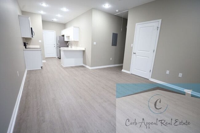 Building Photo - Luxury 2 bed 1 bath apartment - brand new construction!! Washer, dryer and utilities included!!