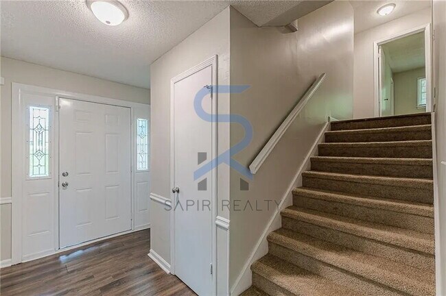 Building Photo - Move in before November 30th and choose your reward: a $250 Amazon Gift Card or a 55 Smart TV!