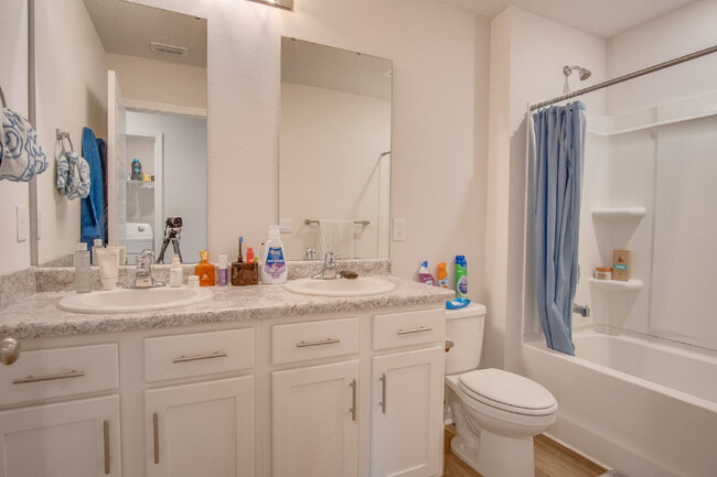 Building Photo - Spacious 4BR Home with 2-Car Garage Near M...