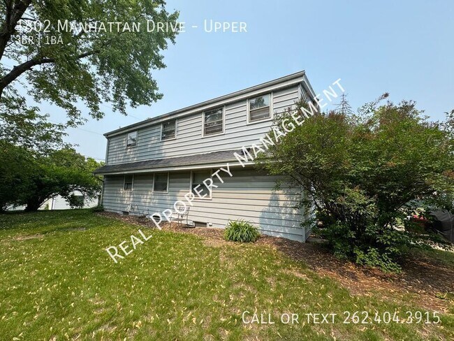 Building Photo - 1802 Manhattan Dr