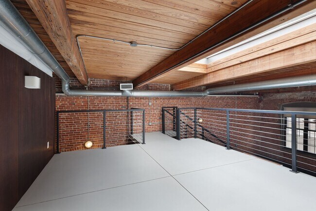 Building Photo - Industrial-Chic 2/2 Loft with Garage Near ...