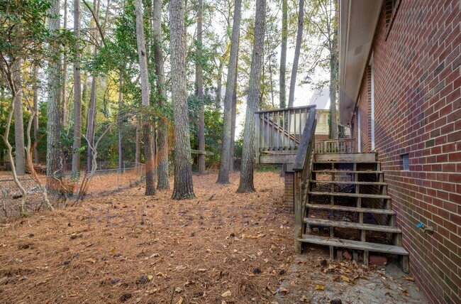 Building Photo - Charming Brick Ranch on a Spacious, Wooded Lot!