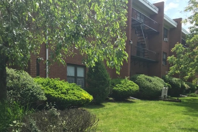 manicured lawns - 821 Central Ave