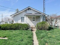 Building Photo - Fenced in Backyard + Garage