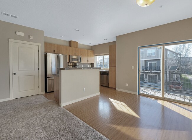 Building Photo - 2BR + 2.1BA Corner Townhome-Style Condo — Dual Primary Suites, Attached Garage & Most Utilities I...