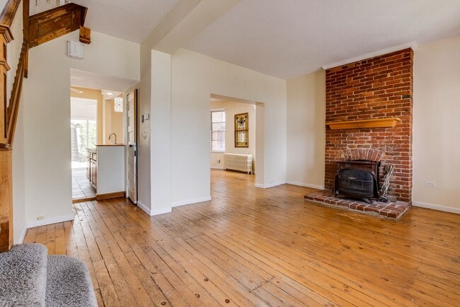 Building Photo - AVAILABLE June 2026 - Beautiful 4 Bedroom, 2 Bath Home w/ Front Porch Swing!