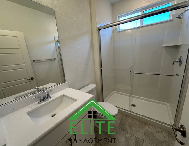 Building Photo - Spacious 5-Bedroom Home with Private In-La...