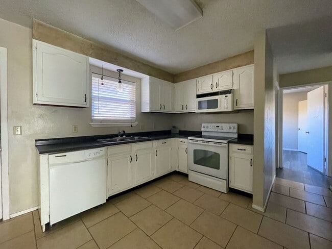 Building Photo - Your Dream Duplex Awaits in Charming Snyder!