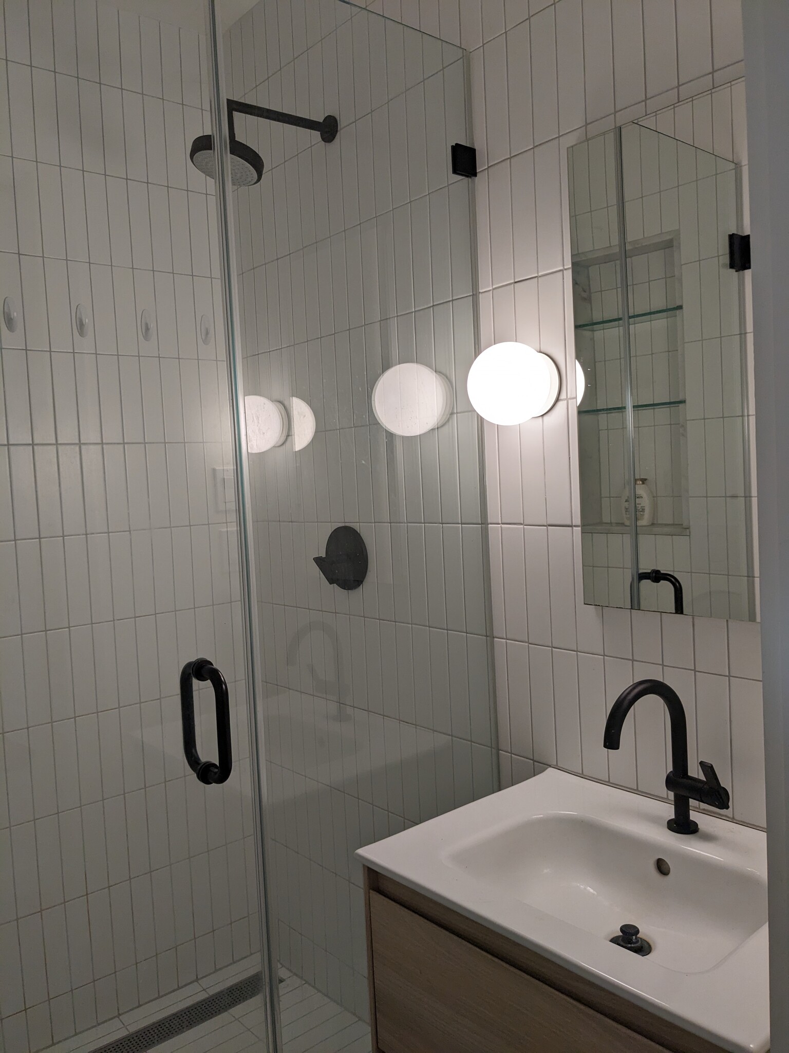 Bathroom has a walk-in shower and low-flow toilet. - 1330 Spruce St