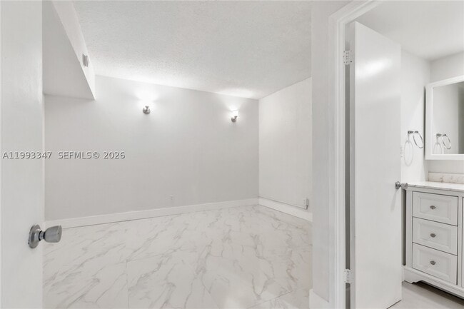 Building Photo - 19380 Collins Ave