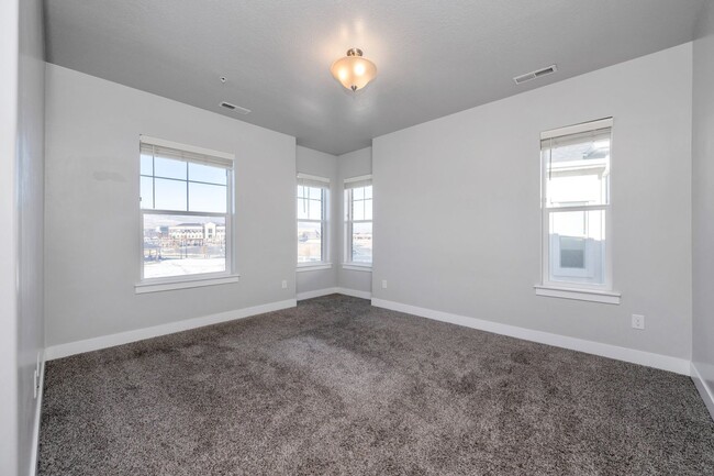 Building Photo - LIKE NEW TOP FLOOR HERRIMAN CONDO - AVAILA...