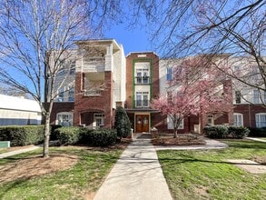 Building Photo - COMING SOON! Charlotte Living at Its Best! 2BR/2BA End Unit + Chef’s Kitchen & Water Included!