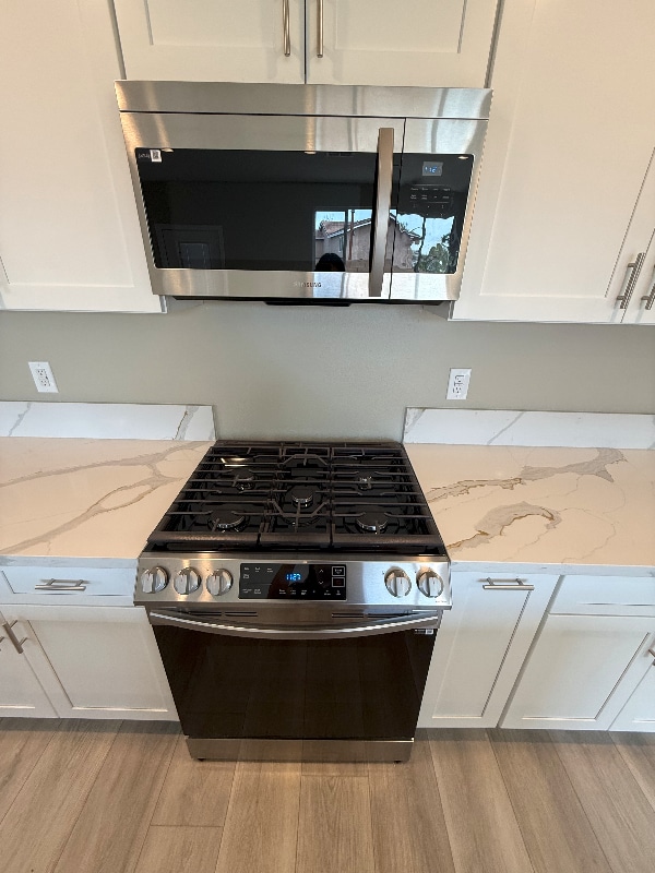 Building Photo - 7398 N Maple Ave