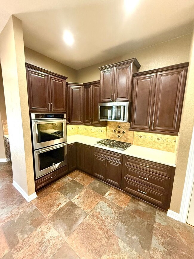 Building Photo - **APPLICATION RECEIVED** *COMING SOON* Luxurious 2-Story Home in Gated Stone Oak Community – Pool...