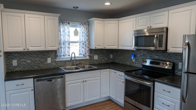 Building Photo - 6 Reno Ct