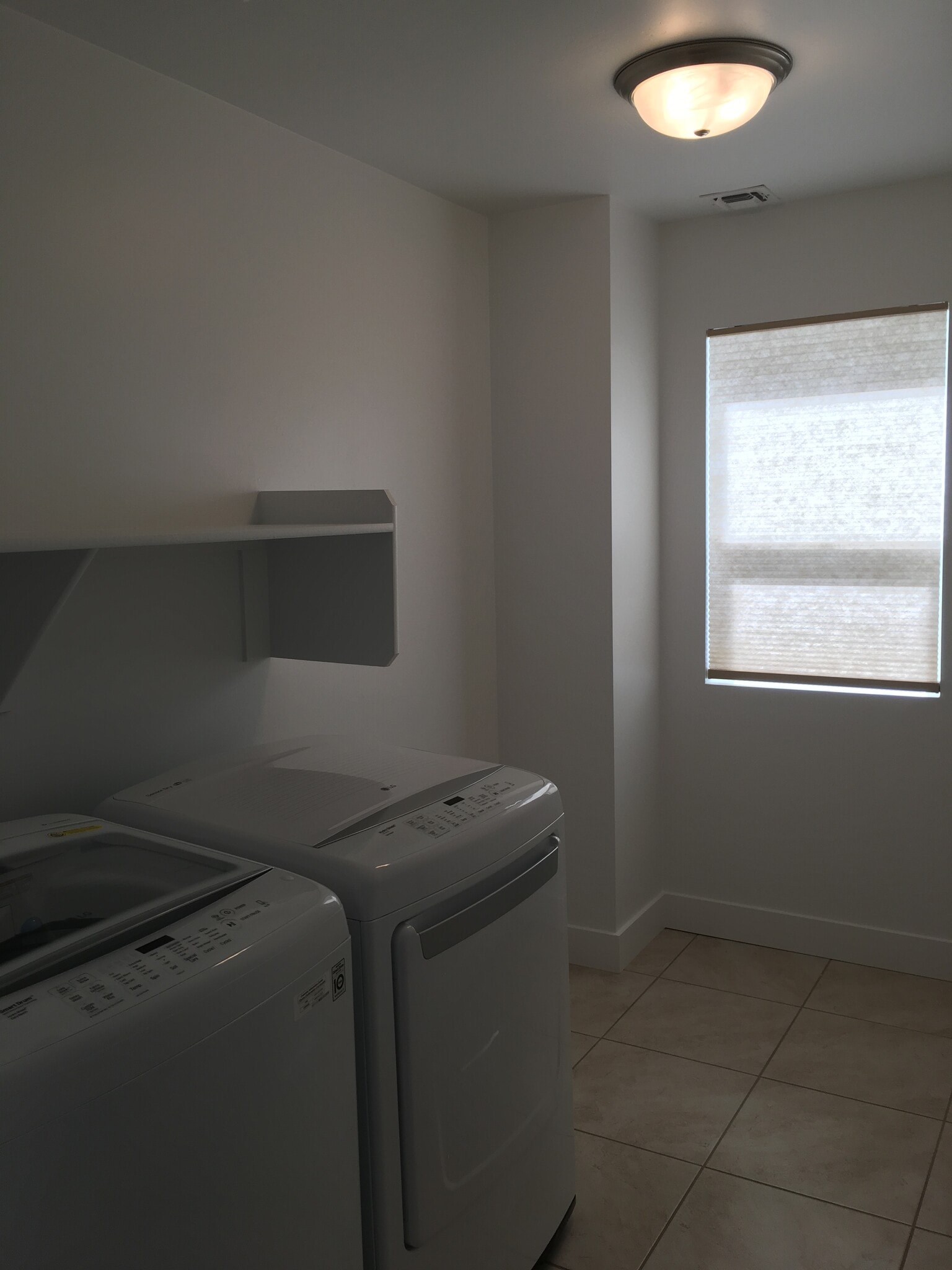 Laundry room with new washer/dryer located upstairs for convenience - 2317 W Mission Timber Cir