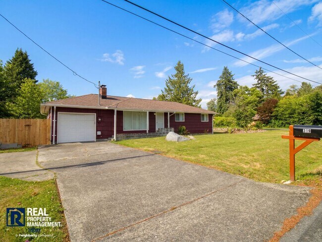 Building Photo - Charming Tacoma Home with Huge Fenced Yard, Garage & Hardwood Floors