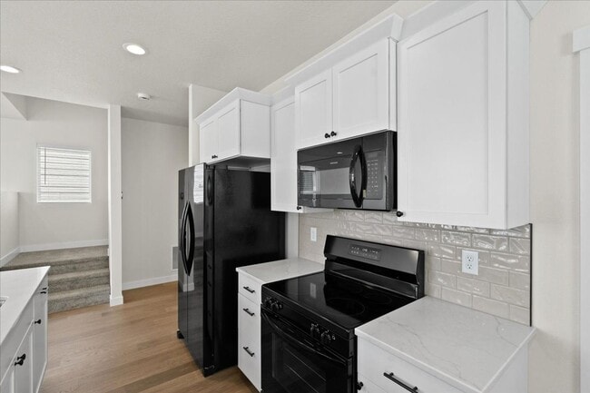 Building Photo - Spacious 4-Bedroom Home with Modern Comforts