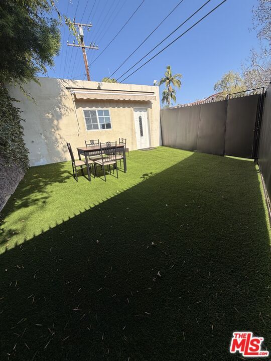 Building Photo - 602-6025 N Maple Dr