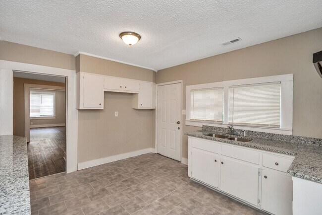 Building Photo - RARE 4BR Bessemer Beauty – Huge Space, Modern Updates & Low Move-In Costs!