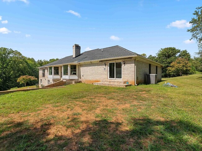 Building Photo - Stunning Oakton Retreat on a Sprawling 5-A...