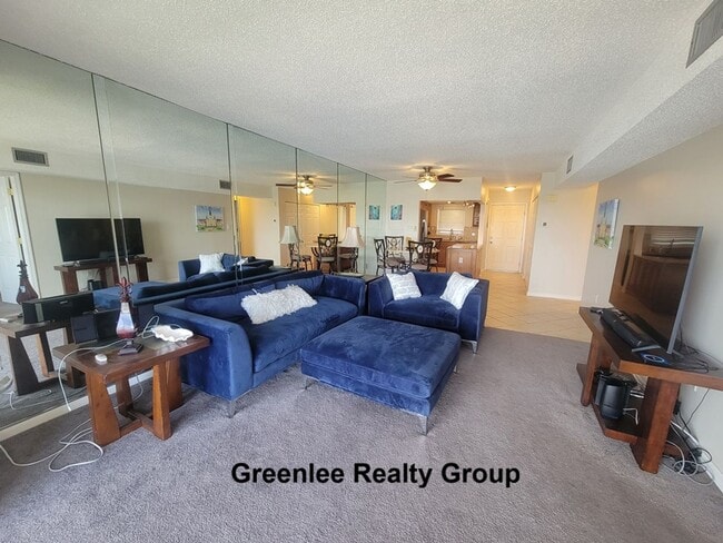 Building Photo - Waterfront Living & Maintenance Free Living at Its Finest – With Views You’ll Never Get Tired Of!