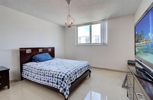 Building Photo - 19380 Collins Ave