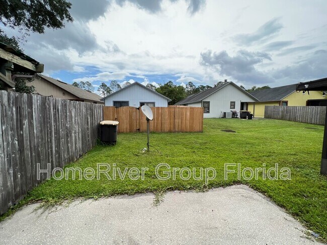 Building Photo - 8745 Whispering Pines Dr