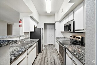 Building Photo - Modern, Pet-Friendly, and Priced Right!
