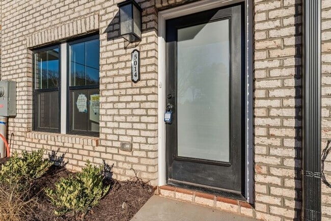 Building Photo - High-End 2BR Townhome | Rooftop Terrace + 2-Car Garage | 24-Unit Community