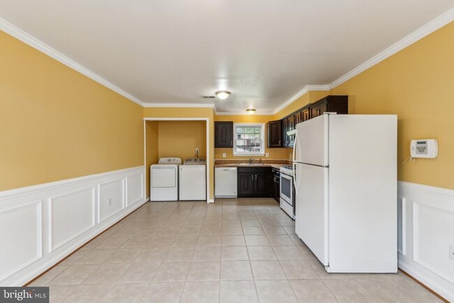 Building Photo - 5566 St Charles Dr