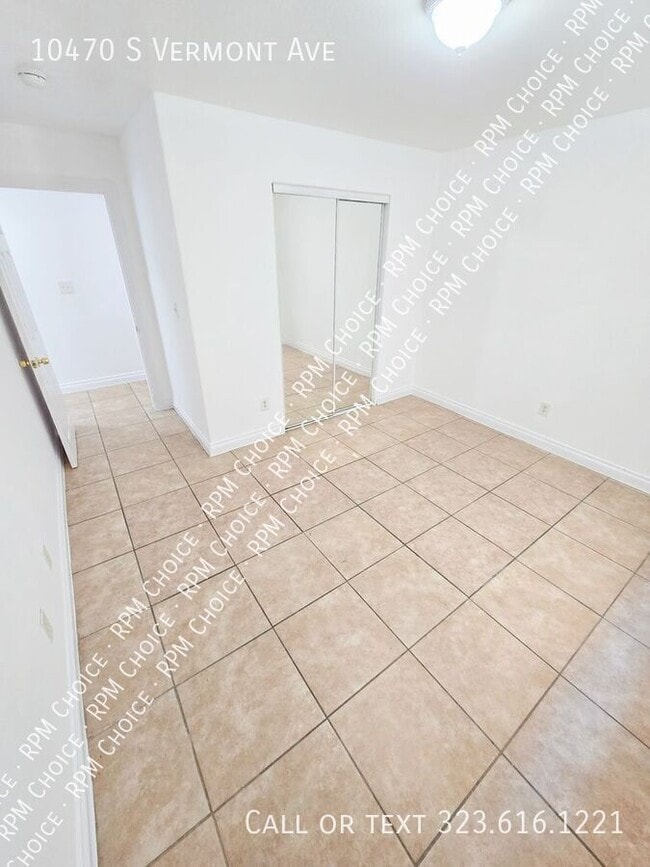 Building Photo - 10470 S Vermont Ave