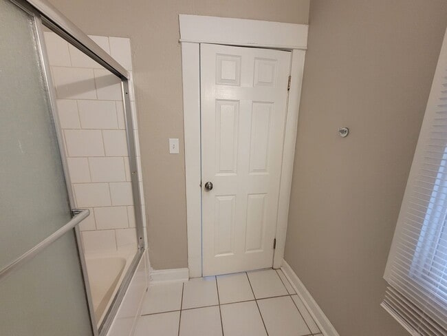 Building Photo - Two bedroom home with partially fenced yard!