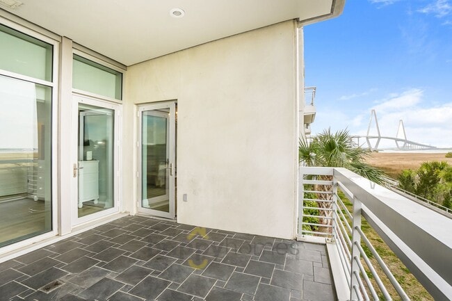 Building Photo - Waterfront Oasis: Fully Furnished 1BR/1.5BA with Marsh Views