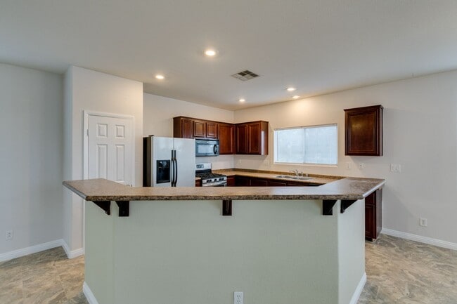 Building Photo - Beautiful Split-Level Home on Corner Lot with Pool and Spa!