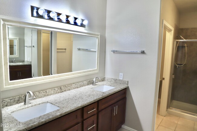 Building Photo - 9555 E Raintree Dr