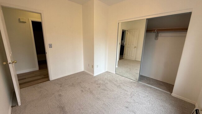 Building Photo - Major Updates! Raised Ranch Style Condo wi...