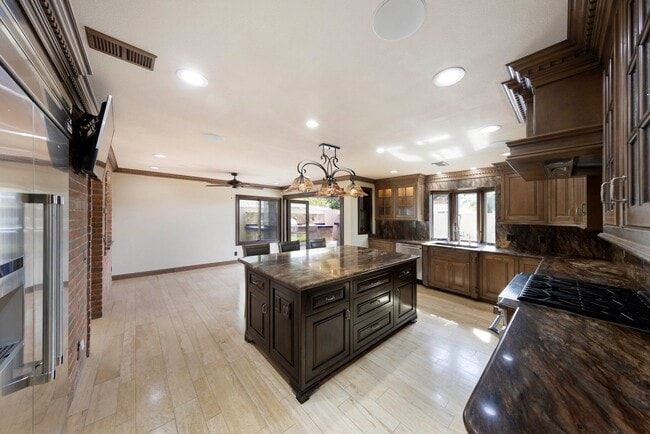 Building Photo - Beautifully maintained Tuscan-style custom home