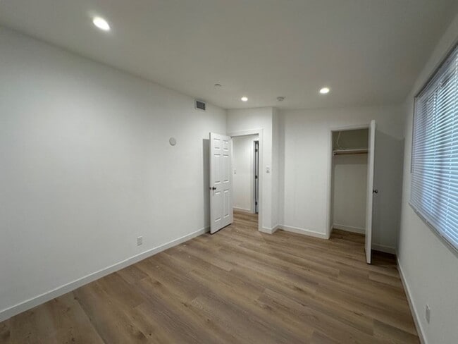 Building Photo - Completely remodeled 4+2 sprawled across a charming street in a beautiful pocket of Reseda