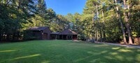 Building Photo - Remodeled secluded wooded oasis off of Qua...
