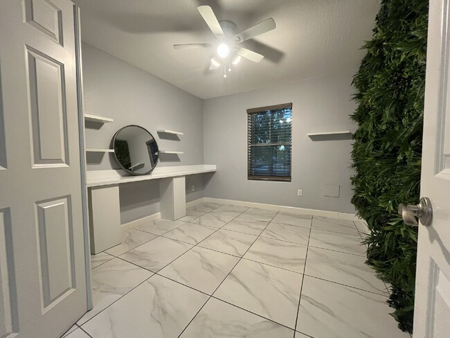 Building Photo - "Charming 4-Bed Oasis with Granite Touch & a Beautiful Pool"