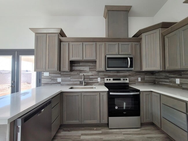 Building Photo - 8670 E 40th Ln