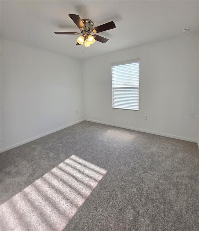 Building Photo - 5126 Magnolia Palm Dr