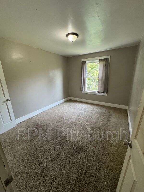 Building Photo - 311-313 W Burgess St