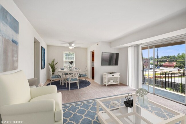 Lovely Living Room with Sliding Glass Door - Whetstone Apartments