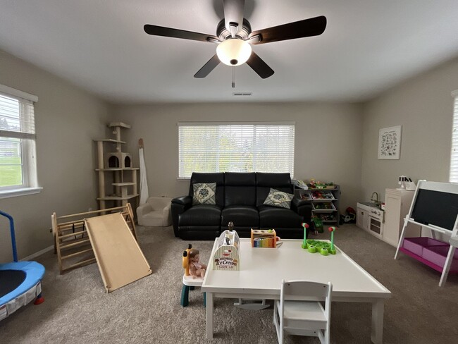 Building Photo - Elegant 5BR + Bonus Room Home with Bay Windows, Entertainment Room & Oversized Primary Retreat